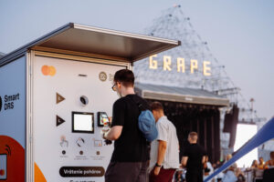 Visitor using a Smart DRS cup return station at Grape Festival 2026