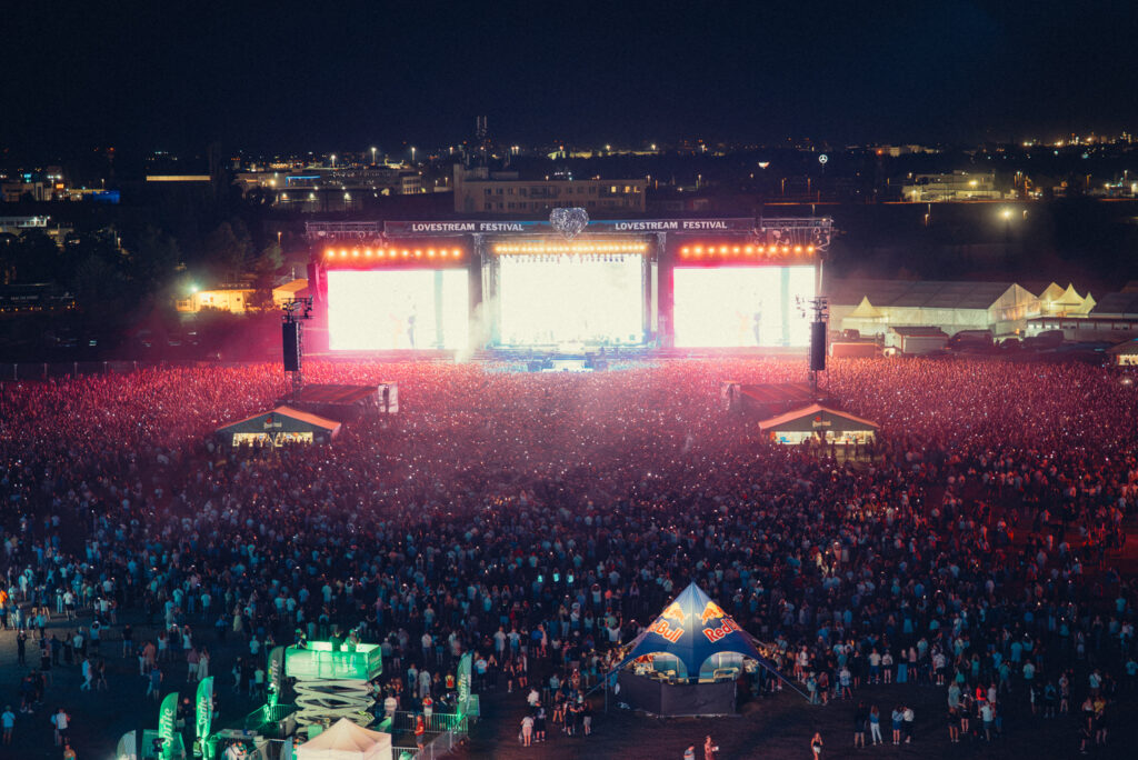 Large crowd watching the main stage at night during LOVESTREAM music festival 2026 in Bratislava.