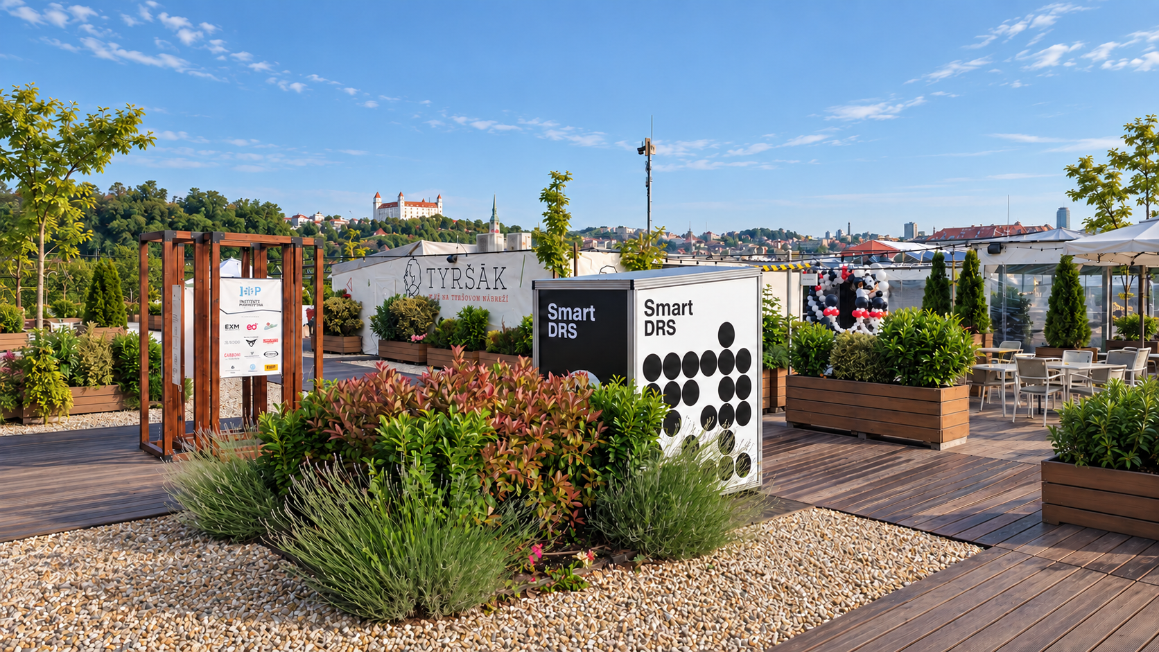 Smart DRS reusable cup return station at Tyršák in Bratislava, with Bratislava Castle in the background