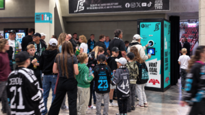 Visitors returning single-use beverage containers at a Smart DRS collection point in a Czech ice hockey arena